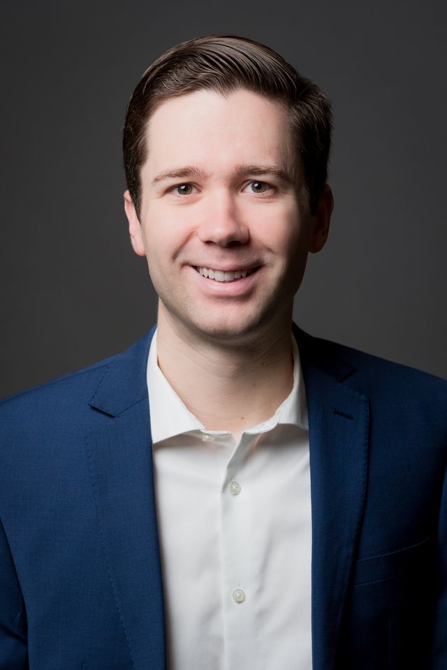 Headshot of director Mark Helms